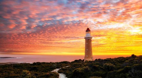 Cape De Couedic lighthouse at sunset sugessted in campervan travel tips WA